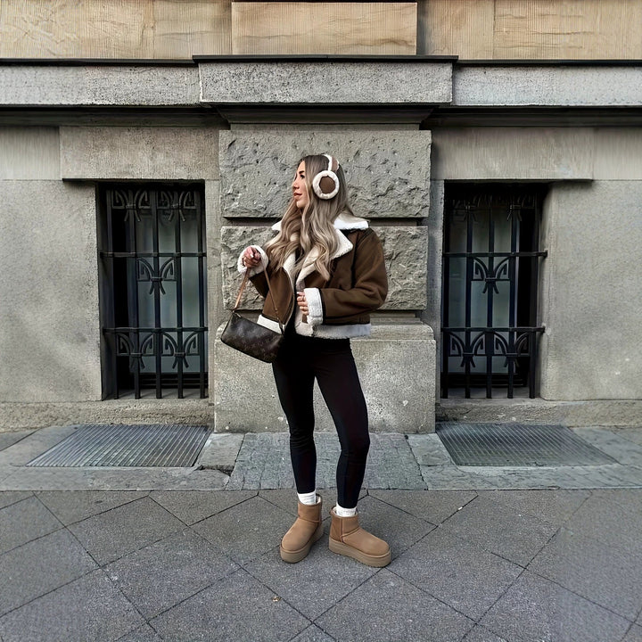Dam avslappnad och varm Sheepskin jacka