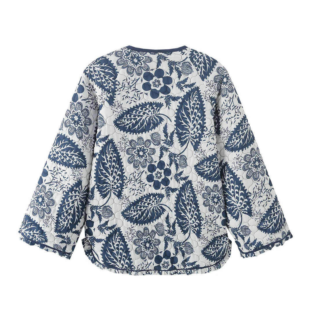 Dam quiltad jacka med floral patchwork tryck, round knäppning och rounded fåll