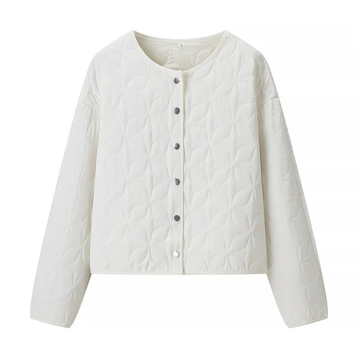 Dam quiltad boxy övergångsjacka med floral quiltad texture, lightly vadderad innerfoder och press stud placket