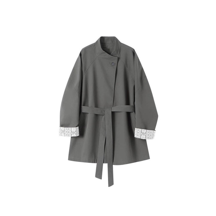Dam elegant trenchcoat med midjebälte och kontrast ärmar