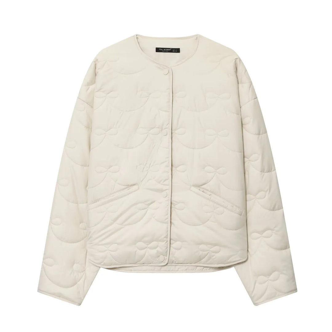 Dam vadderad kort jacka med bow quiltning och round neckline