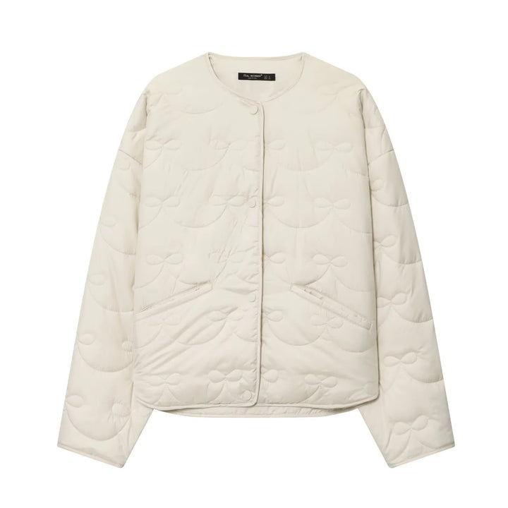Dam vadderad kort jacka med bow quiltning och round neckline