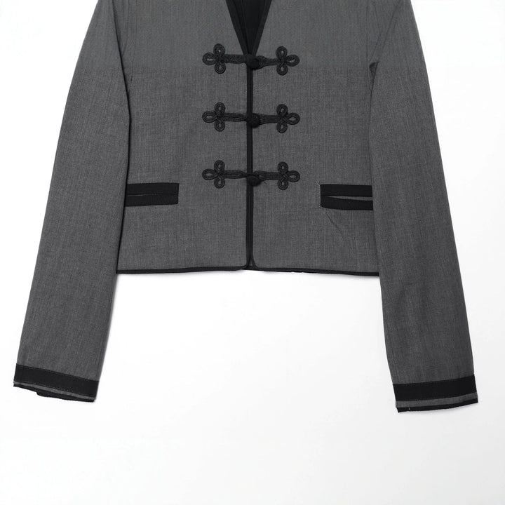 Dam figursydd cropped jacka med mandarin krage och decorative frog closures