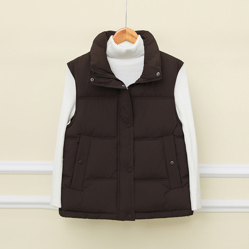 Dam non-vadderad sleeveless thermo quiltad väst med extra high standing krage och concealed snap knäppning