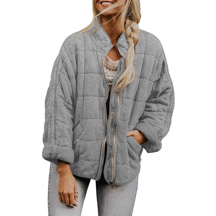 Dam oversize kviltad jacka med dragkedja och sidofickor