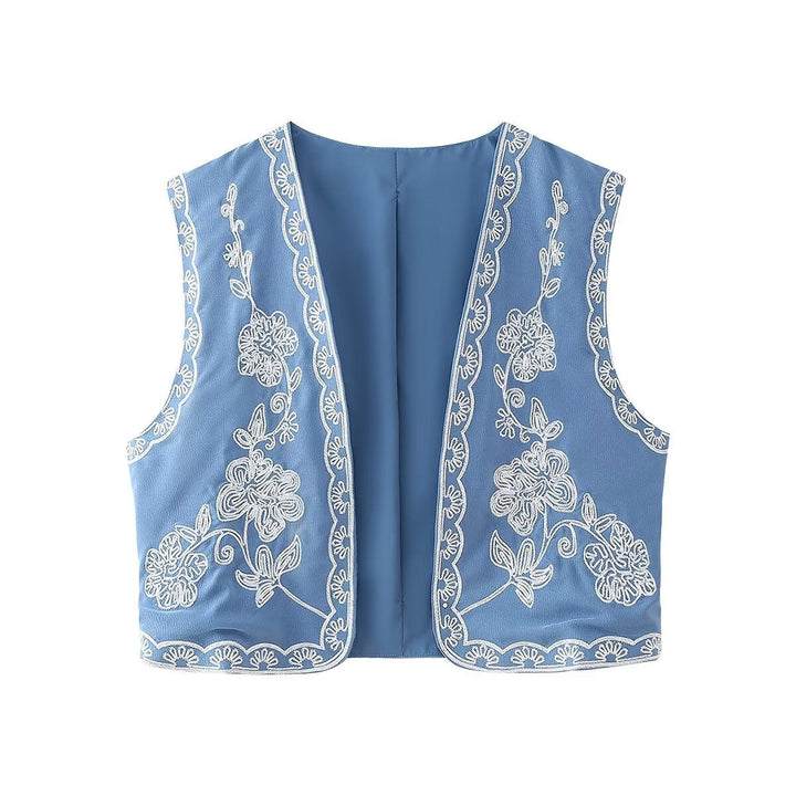 Dam embroidered kort väst med floral embroidery, öppen front och fine fåll decoration