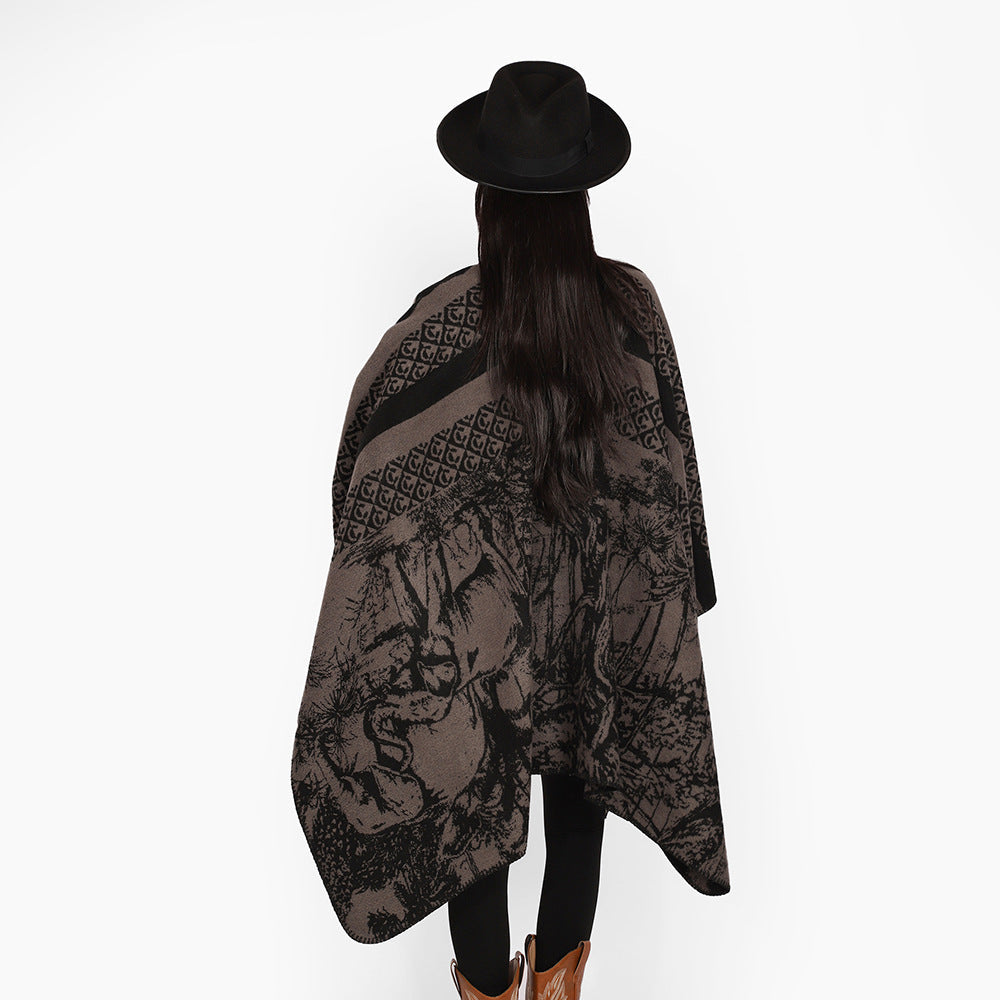 Dam jacquard stickad cape med ståkrage och graphic forest design