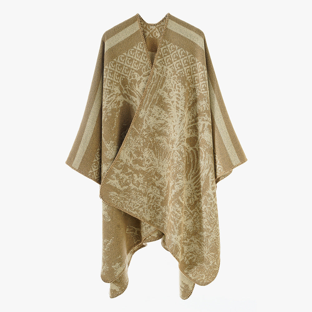 Dam jacquard stickad cape med ståkrage och graphic forest design