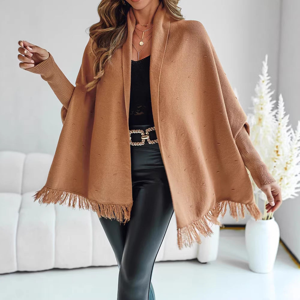 Dam Fringe poncho kofta med decorative midjebälte och ribbstickade muddar