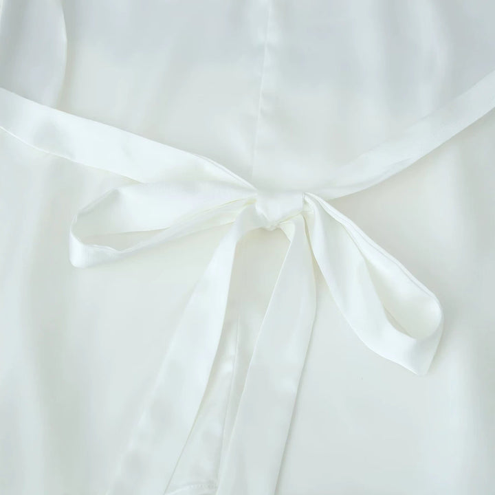 Dam shoulder cape med blommig lace edge och vid fall