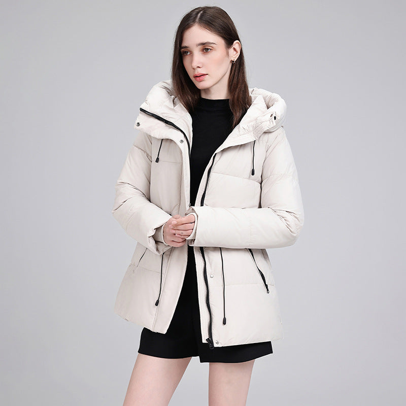Dam vadderad hooded parka med adjustable drawstring, concealed dragkedja och ribbstickade muddar