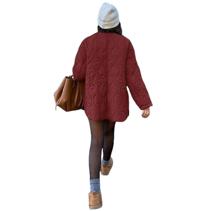 Dam kviltad jacka in oversize design med curved quilting och sido slit