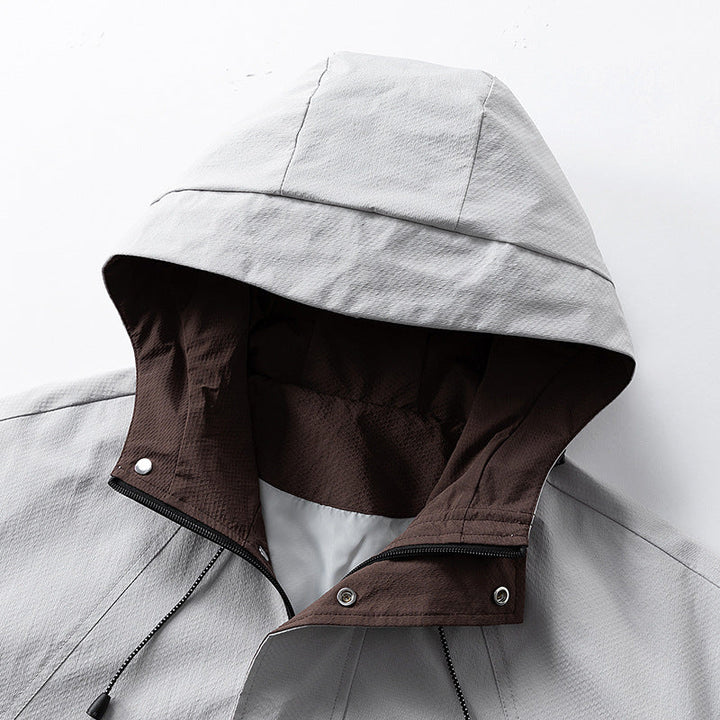 Unisex lätt vindtät outdoorjacka med huva, vattenavvisande outer shell och adjustable fåll