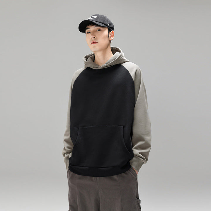Herr Kapuzenpullover Im Colourblock-Design med Raglanärmeln, Kängurutasche och Ribbad Fåll
