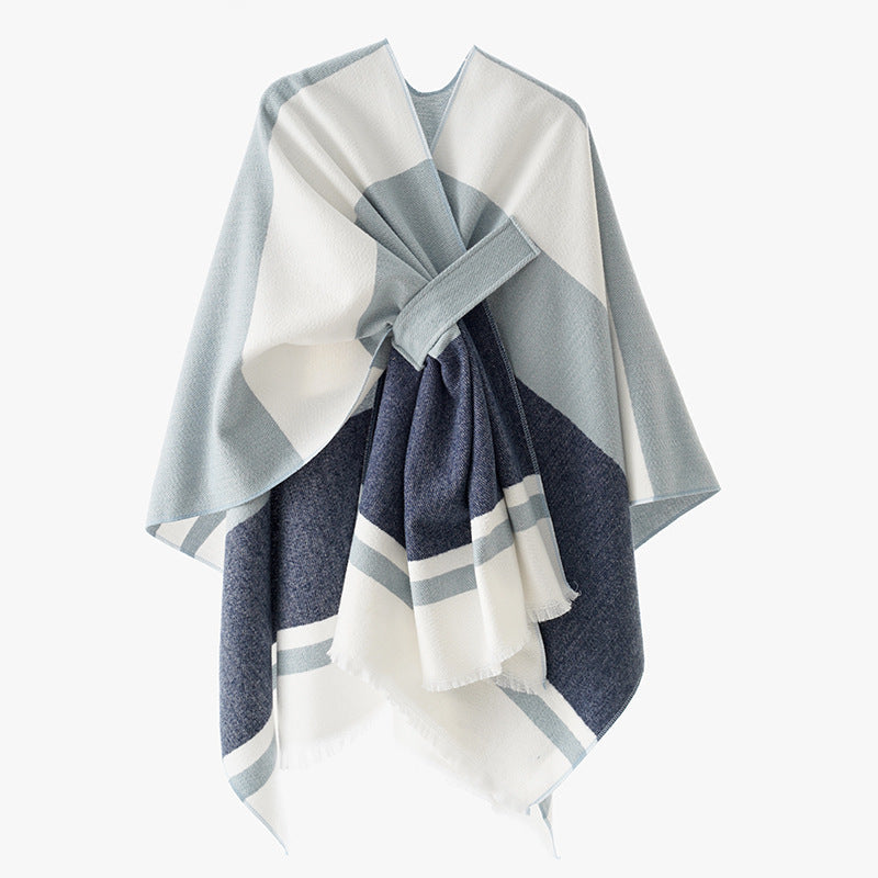 Dam oversized capeponcho tillverkad av ullblandning med tie loop och randig border
