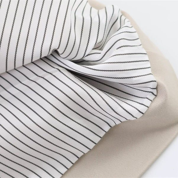 Dam kort skärning oversize trenchcoat med bälte och double-breasted knappslå