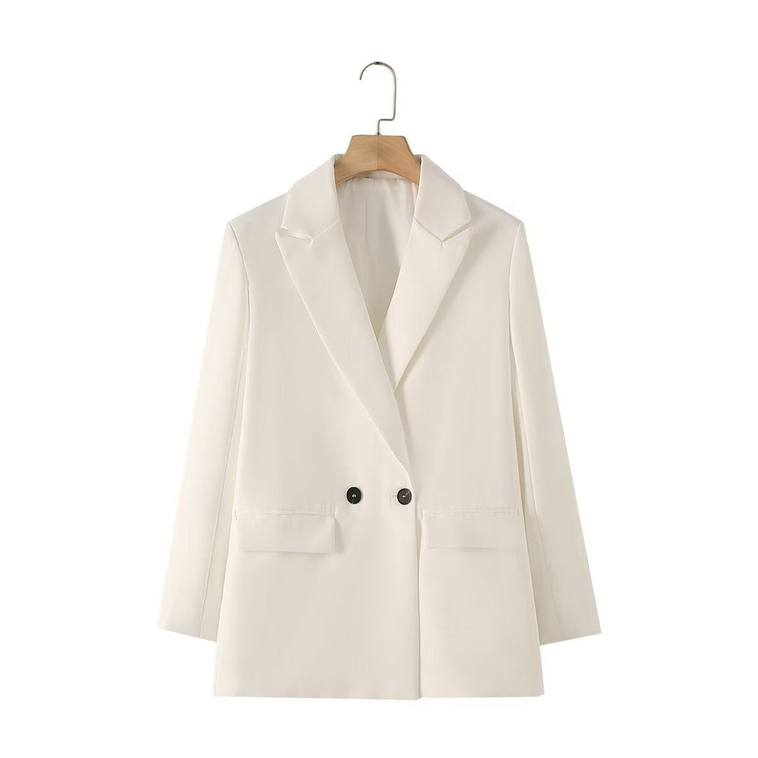 Dam figursydd lång blazer i oversized look med lapel krage och påsydda fickor
