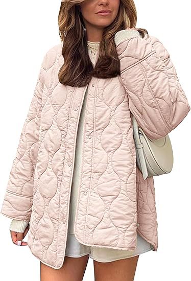 Dam kviltad jacka in oversize design med curved quilting och sido slit