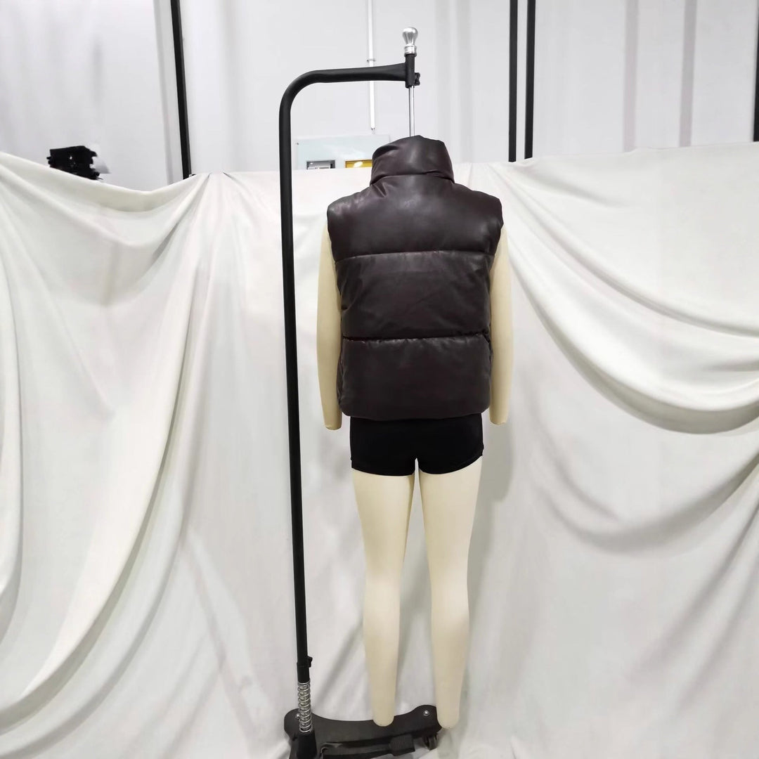 Dam vadderad konstläder väst med high ståkrage, snap knäppning och waist drawstring