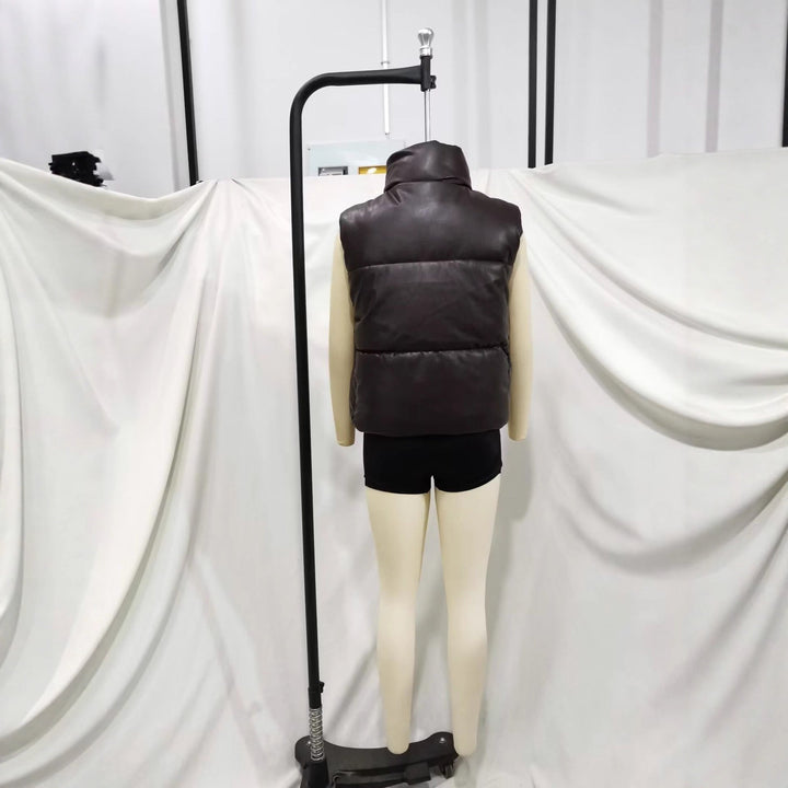 Dam vadderad konstläder väst med high ståkrage, snap knäppning och waist drawstring