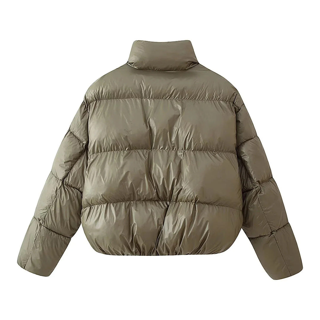 Dam kort skärning quiltad oversized down look jacka med ståkrage och elastisk fåll