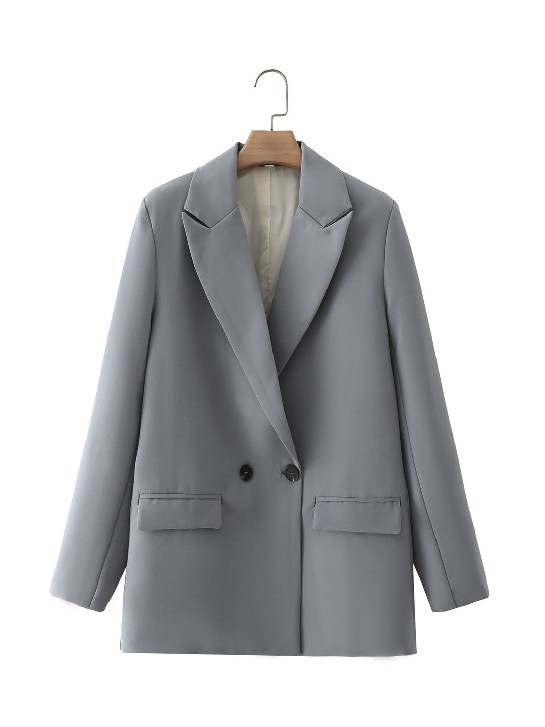 Dam figursydd lång blazer i oversized look med lapel krage och påsydda fickor