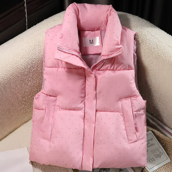Dam non-quiltad sleeveless thermal väst med high standing krage, concealed dragkedja placket, och fine dot tryck