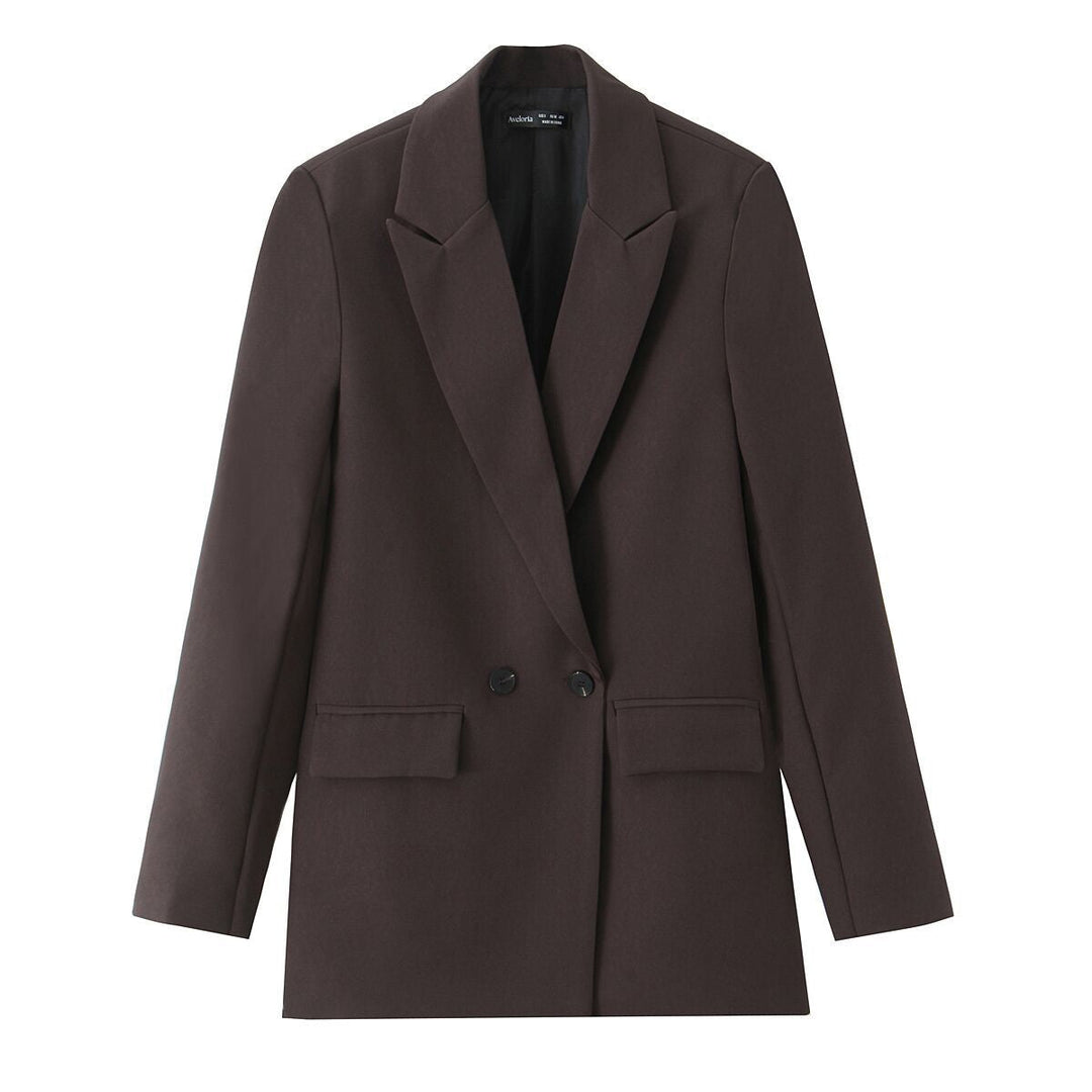 Dam figursydd lång blazer i oversized look med lapel krage och påsydda fickor