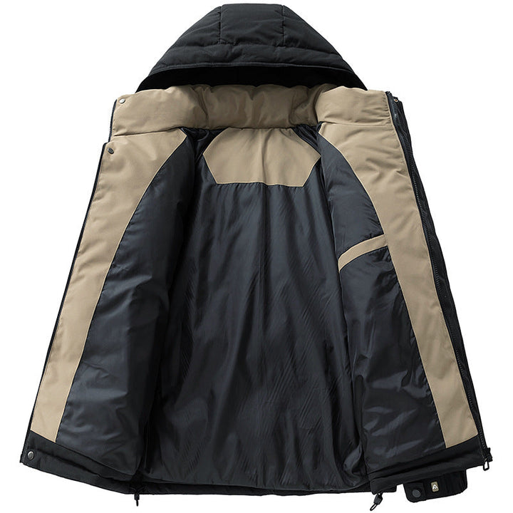 Herr quiltad med huva parka med värmande foder och vindtät ytterskal
