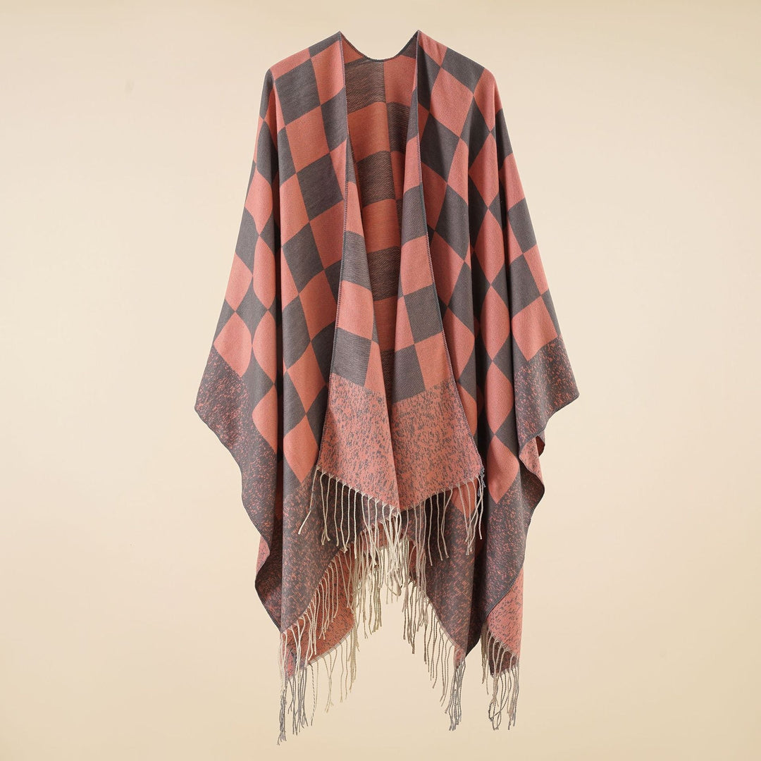 Dam oversized woven poncho med diamond mönster och fringes