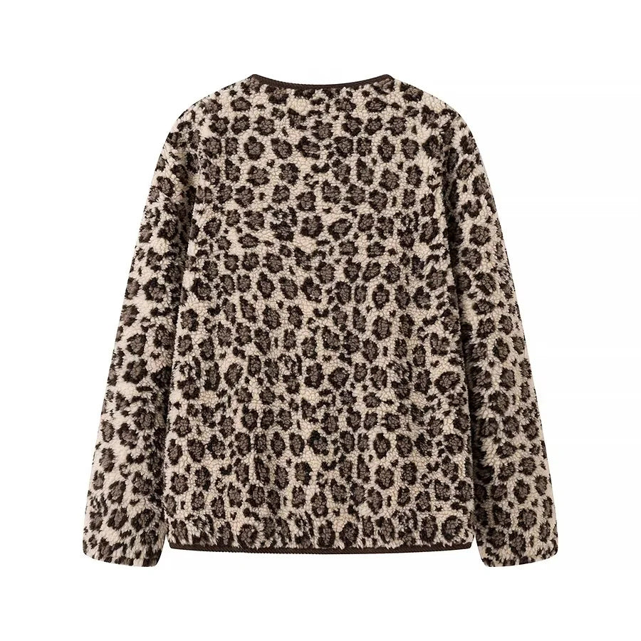Dam teddy jacka med leopardprint button closure och manchester kant