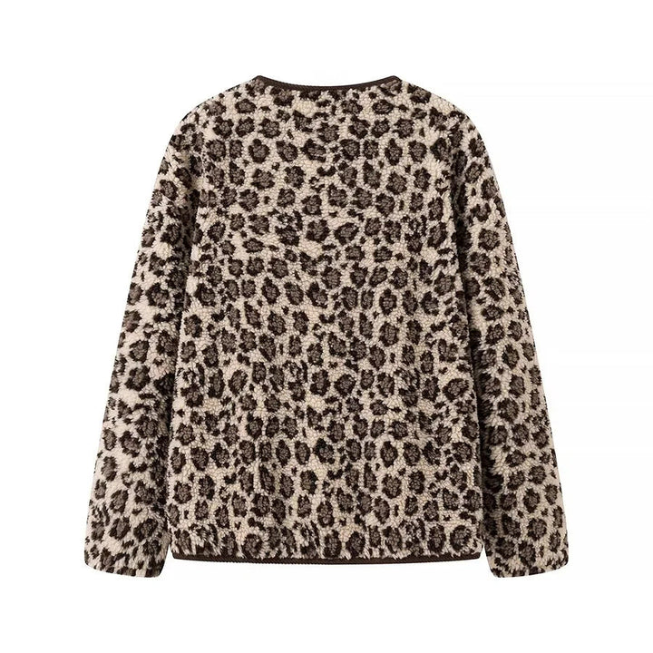 Dam teddy jacka med leopardprint button closure och manchester kant