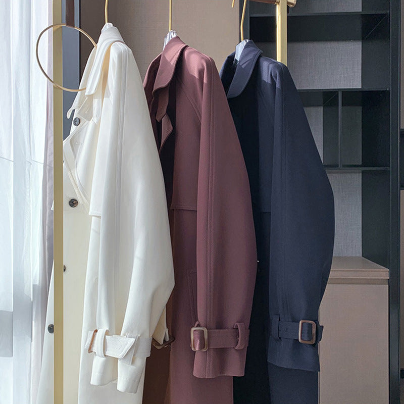 Dam trenchcoat med double knappslå och midjebälte