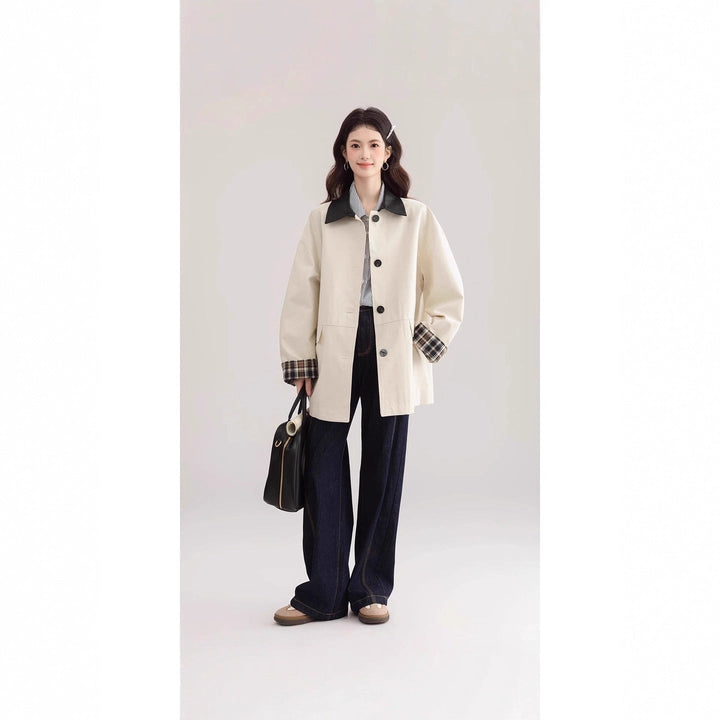 Dam oversize trenchcoat med kontrast krage och rutig foder