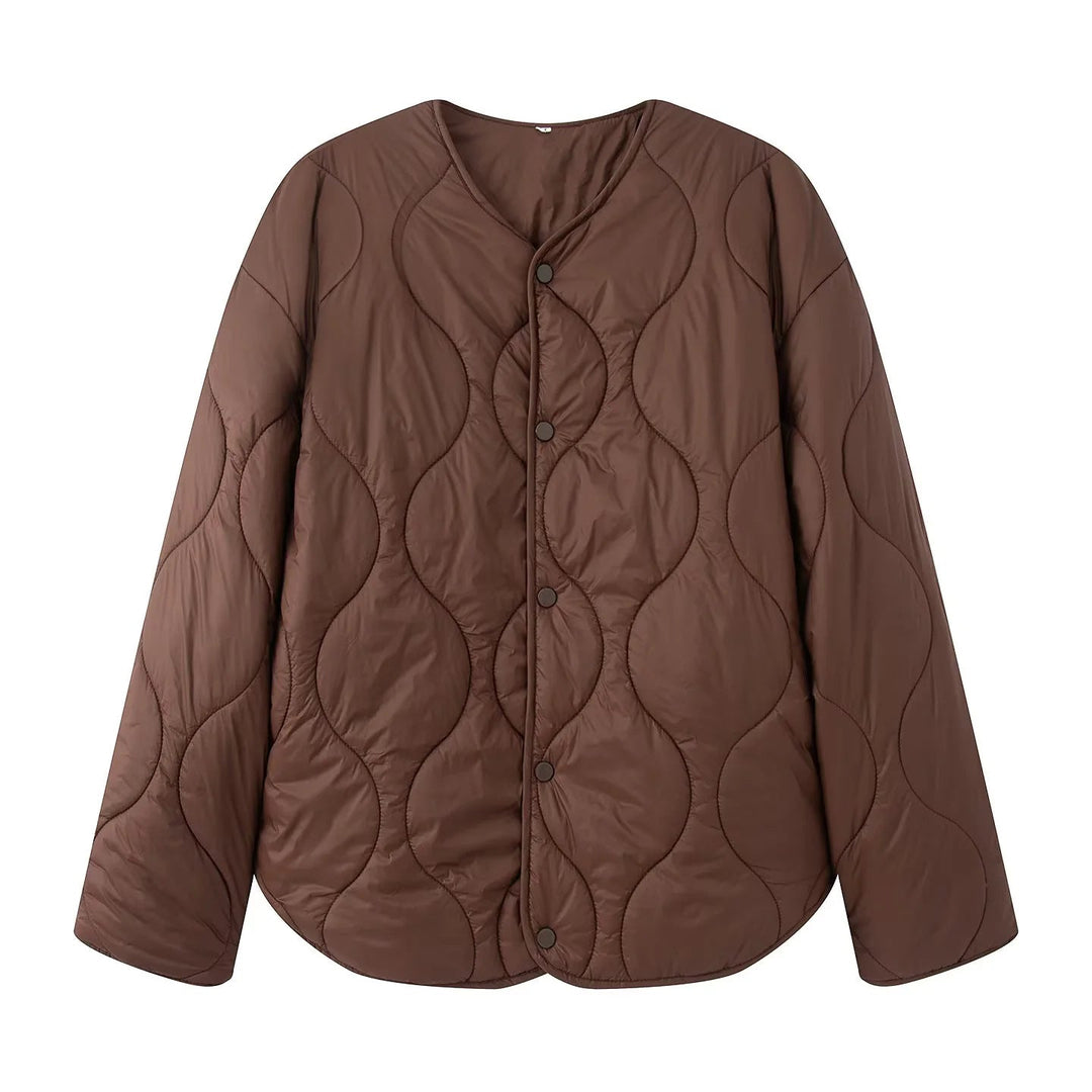 Dam quiltad övergångsjacka med round neckline, tryckknäppning, och curved fåll