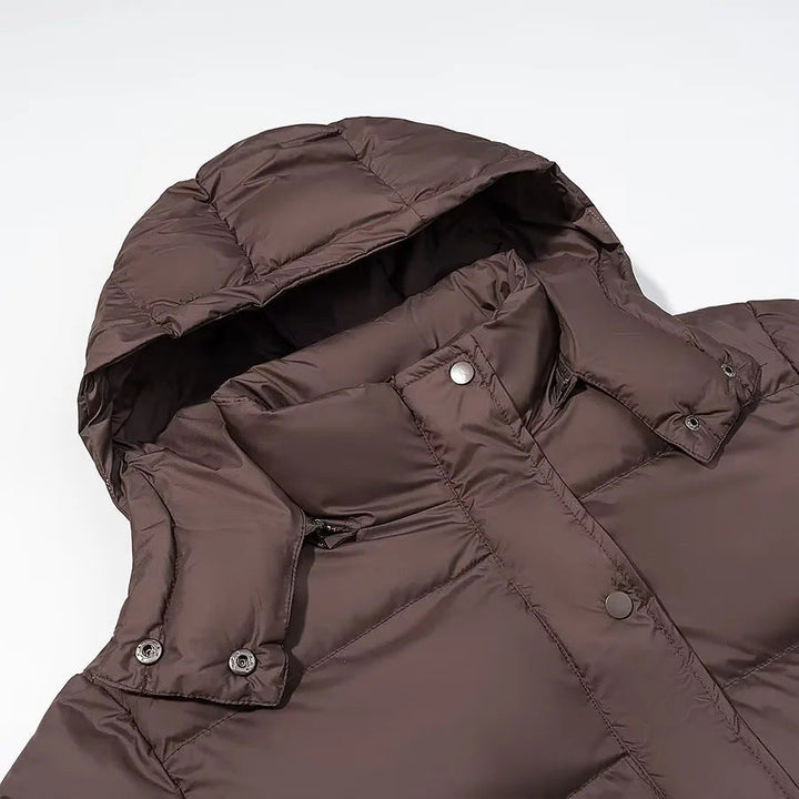 Dam kort quiltad vadderad jacka med avtagbar huva och drawstring fåll