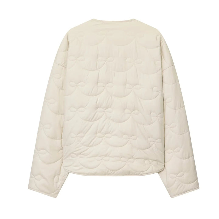 Dam vadderad kort jacka med bow quiltning och round neckline