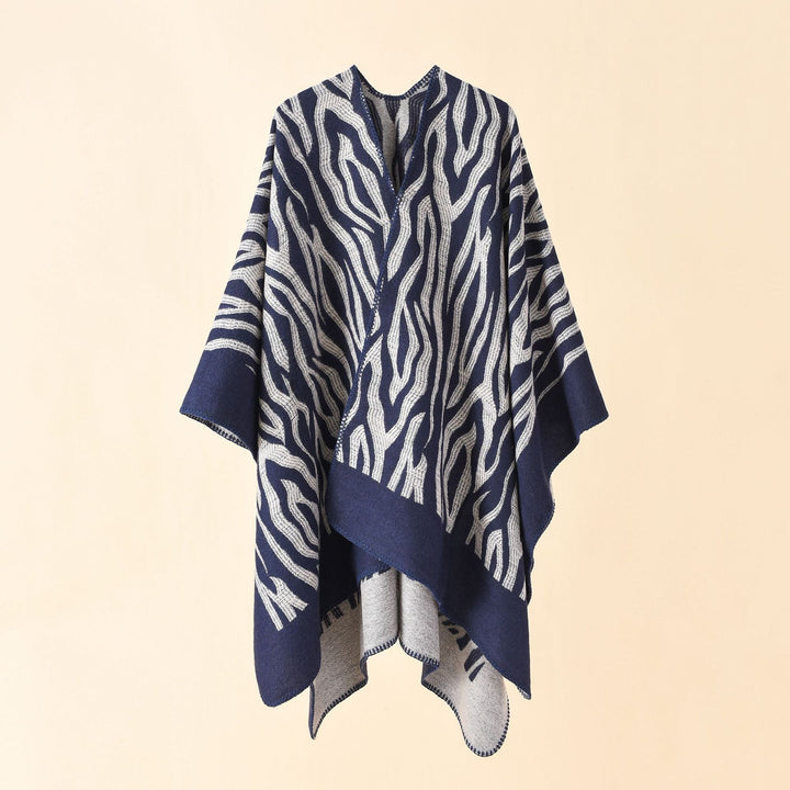 Dam Zebra Jacquard poncho Cape i oversized kimono passform tillverkad av mjuk fine stickad