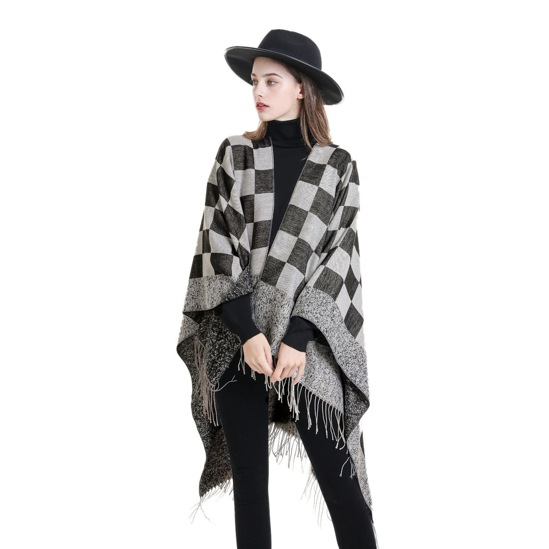 Dam oversized woven poncho med diamond mönster och fringes