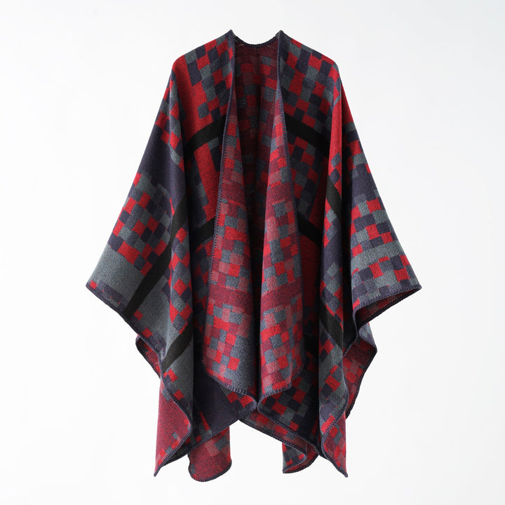 Dam Kastiger Web poncho med graphic jacquard och fringe edge