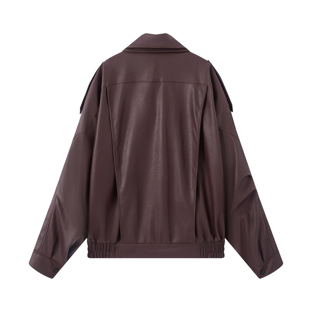 Dam oversized bikerjacka tillverkad av vegan läder look med asymmetrisk dragkedja, bred sjalkrage och waist-accentuating bälte
