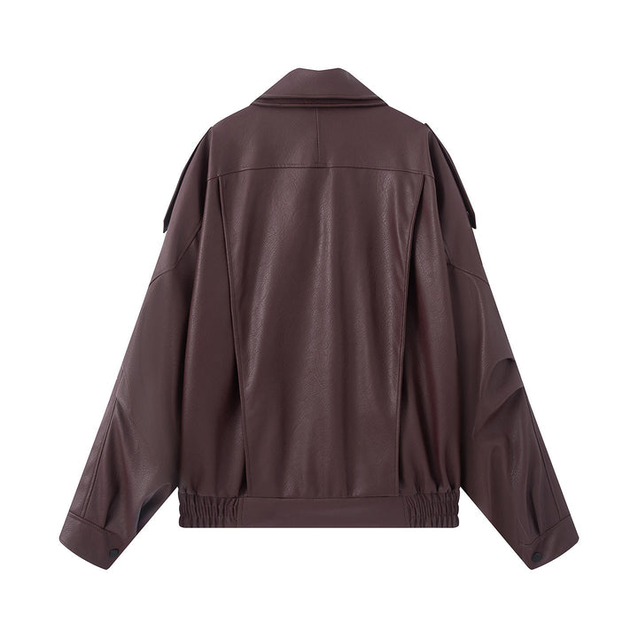 Dam oversized bikerjacka tillverkad av vegan läder look med asymmetrisk dragkedja, bred sjalkrage och waist-accentuating bälte