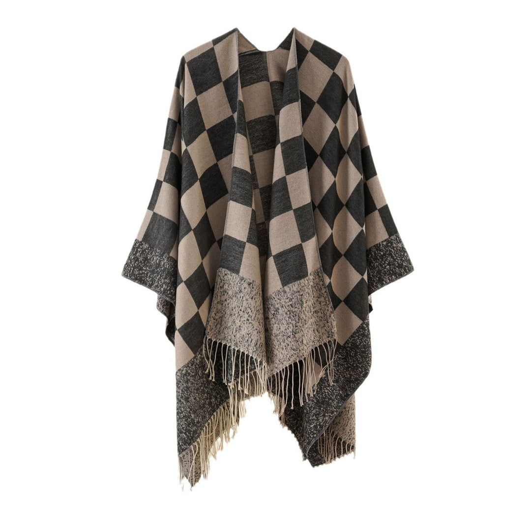 Dam oversized woven poncho med diamond mönster och fringes