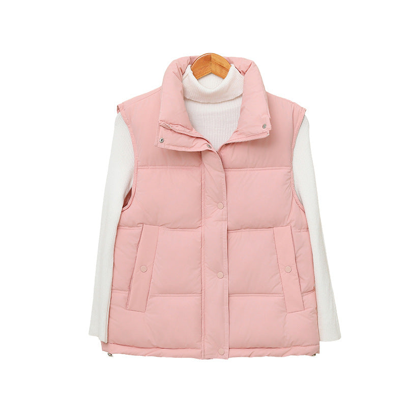 Dam non-vadderad sleeveless thermo quiltad väst med extra high standing krage och concealed snap knäppning