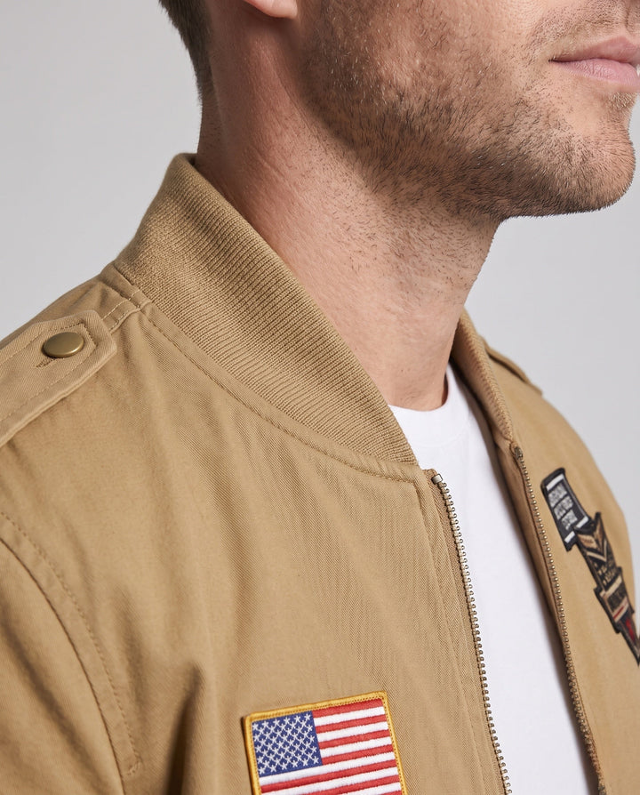 Herr pilot bomberjacka i canvas funktion stil med badge, ärm ficka, och ribbade muddar