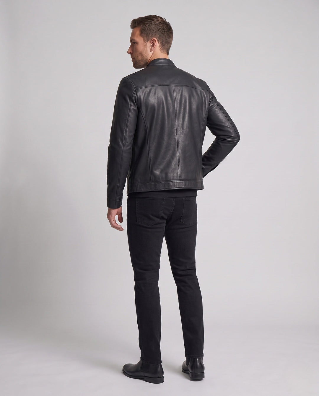 Herr slim Moto jacka tillverkad av fuskläder med en minimalistisk ståkrage och dold dragkedja