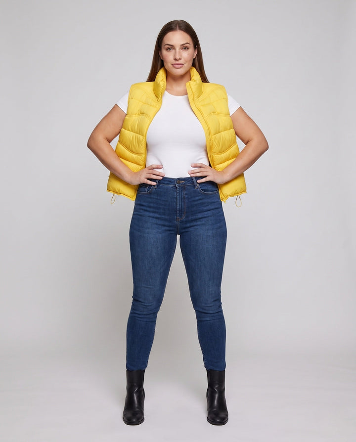 Dam ärmlös thermo kviltad väst med ergonomic wave quilting, hög krage och justerbar dragsko fåll
