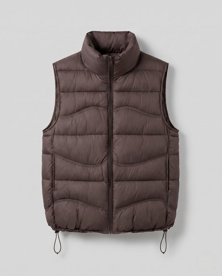 Dam ärmlös thermo kviltad väst med ergonomic wave quilting, hög krage och justerbar dragsko fåll