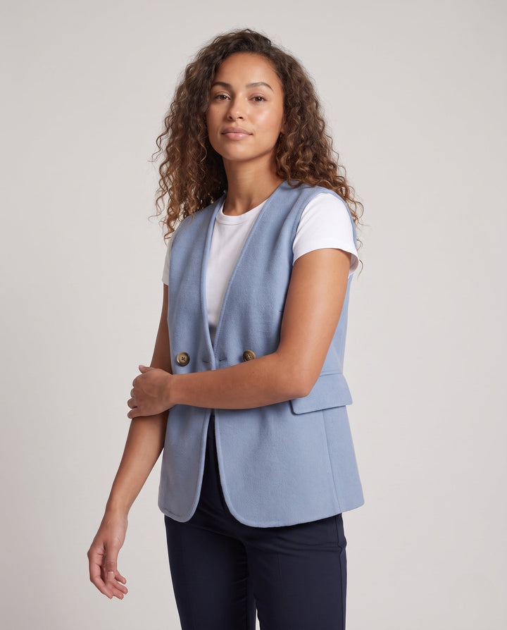 Dam ärmlös double-breasted ullblandning väst med utanpåfickor och curved hemline